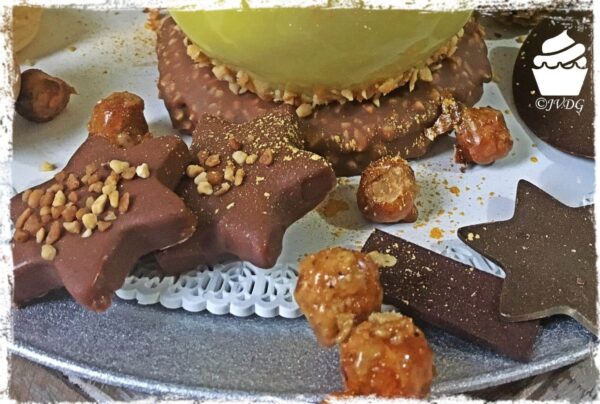 Étoiles au chocolat et noisettes au pied de la bûche Sur son 31
